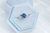 Black opal and diamond trilogy ring