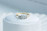 Diamond trilogy engagement ring