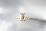 Emerald cut diamond solitaire engagement ring