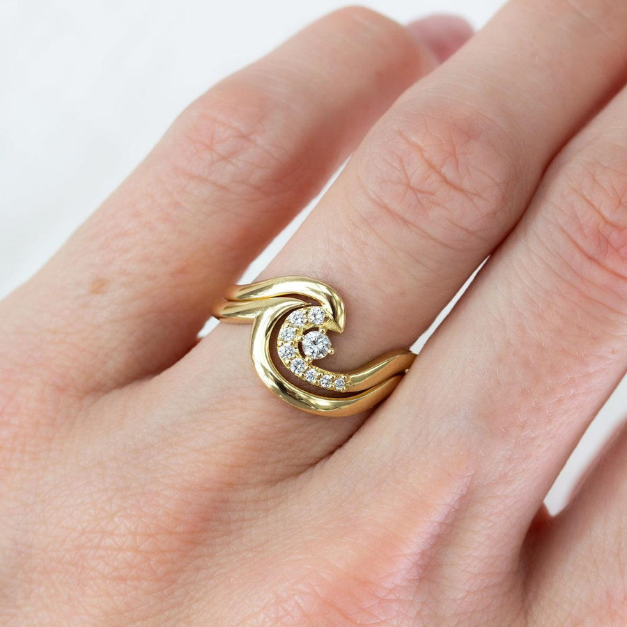 Diamond Wave Ring Set in Yellow Gold on the hand by Amy Jennifer Jewellery