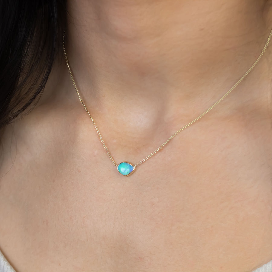 Aqua coloured crystal opal necklace in 9 carat yellow gold with 16inch chain